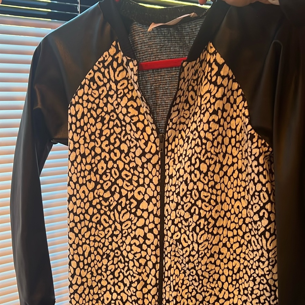 Black and white leopard zip up with pleather sleeves